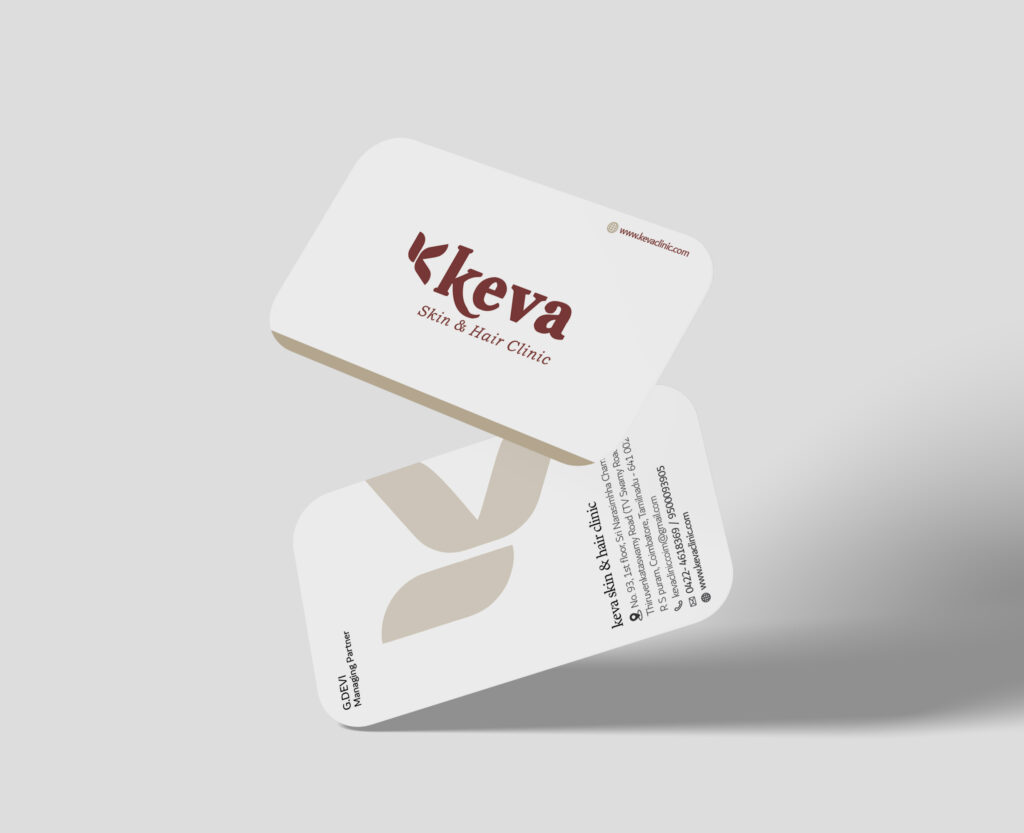 Business card mockup for Keva Skin & Hair Clinic showcasing a minimalist design with soft brown and beige tones, featuring rounded edges. The front displays the clinic’s logo, while the back includes contact details in a clean layout. Ideal for promoting professional services with a premium aesthetic. Perfect for businesses seeking the best printing service in Chennai for quality business cards.